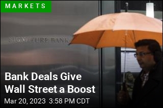 Bank Deals Give Wall Street a Boost