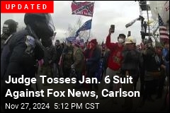 Protester Sues Carlson, Fox Over Jan. 6 Conspiracy Theory