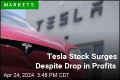 Tesla Surges 12.1% Despite Drop in Profits