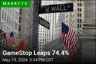 Wall Street Hovers Near Record Highs