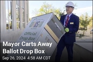 Mayor Carts Away Ballot Drop Box