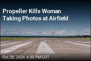 Propeller Kills Woman Taking Photos at Airfield