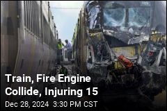 Train, Fire Engine Collide, Injuring 15