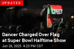 Performer Won&#39;t Be Charged Over Flag at Halftime Show
