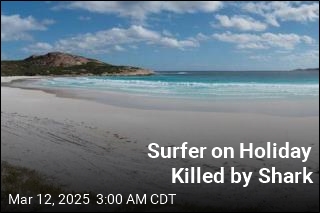 Surfer on Holiday Killed by Shark