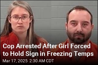 Cop Arrested After Girl Forced to Hold Sign in Freezing Cold