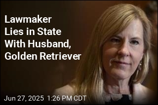 Lawmaker Lies in State With Husband, Dog