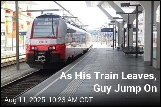 As High-Speed Train Departs, Man Grabs On