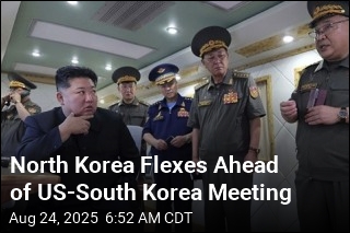 Kim Oversees Tests of New Defense Missiles