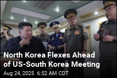 Kim Oversees Tests of New Defense Missiles