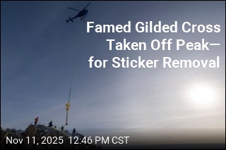 Famed German Cross Taken Off Peak&mdash; for Sticker Removal