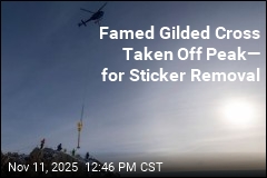 Famed German Cross Taken Off Peak&mdash; for Sticker Removal