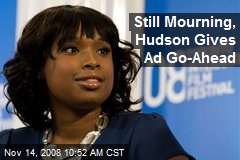 Still Mourning, Hudson Gives Ad Go-Ahead