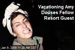 Vacationing Amy Douses Fellow Resort Guest