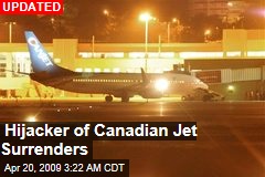 Hijacker of Canadian Jet Surrenders