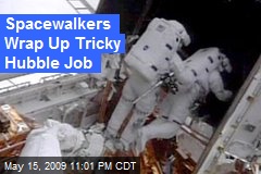 Spacewalkers Wrap Up Tricky Hubble Job