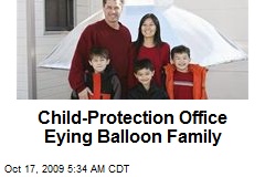 Child-Protection Office Eying Balloon Family