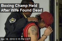 Boxing Champ Held After Wife Found Dead