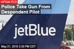 Police Take Gun From Despondent Pilot